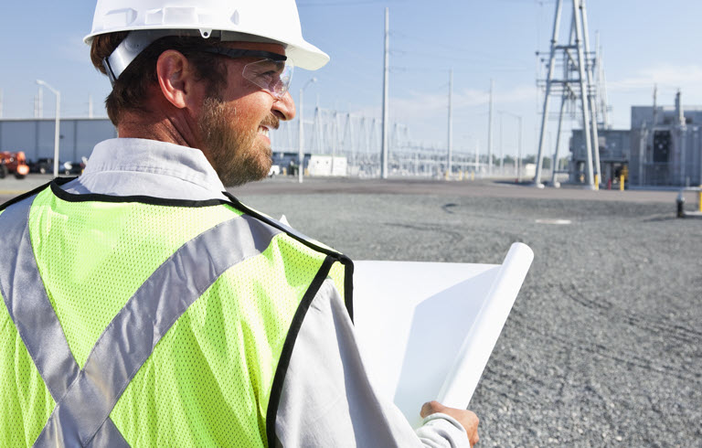 Engineer with document